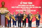 Top leader presents Ho Chi Minh Order to five former Politburo members
