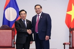 范明正总理会见老挝总理并与东盟领导人举行双边会晤