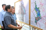 政府总理范明正考察安沛省若干工程和项目