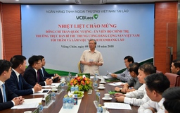 Thường trực Ban Bí thư Trần Quốc Vượng thăm và làm việc với Vietcombank Lào