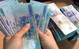 Thay đổi lương tối thiểu vùng, phải đăng ký lại bảng lương?