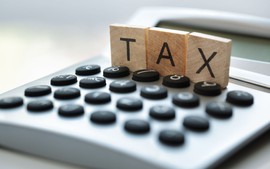 Có được ấn định doanh thu tính thuế cho hộ kinh doanh?
