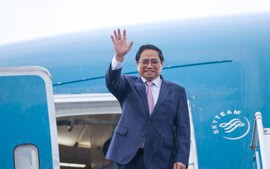越南政府总理范明正离开美国前往巴西进行正式访问