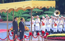越南政府总理范明正主持仪式 欢迎老挝总理宋赛&#183;西潘敦对越南进行正式访问（组图）