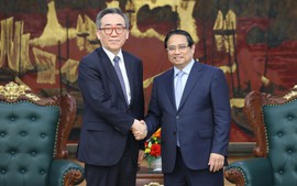 范明正总理会见韩国外长周泰悦