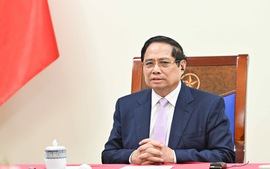 越南政府总理范明正与马来西亚总理安瓦尔•易卜拉欣通电话