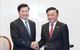 越共中央书记处常务书记陈锦绣为老挝人民革命党总书记、国家主席主持欢送仪式