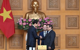 越南政府总理范明政会见中国驻越南特命全权大使何炜