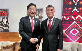 黎明兴总理会见新加坡总理黄循财