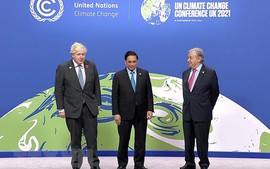 PM Pham Minh Chinh attends opening ceremony of COP26
