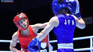 Tam wins Asian boxing gold medal