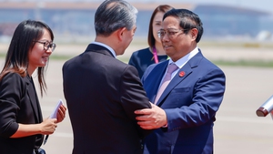 范明正总理抵达中国北京