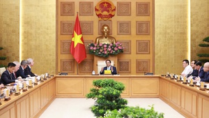 范明正总理：越南在改革并继续推进改革进程