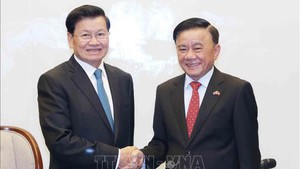 越共中央书记处常务书记陈锦绣为老挝人民革命党总书记、国家主席主持欢送仪式