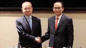 越共中央政治局委员、外交部长黎怀忠与中共中央总书记、国家主席习近平特使刘海星举行会谈