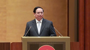 范明政总理：越共十四大在历届代表大会历史上首次颁布行动计划