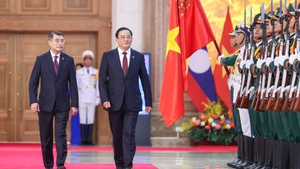 越南政府总理黎明兴主持仪式 欢迎老挝总理宋赛·西潘敦对越南进行正式访问